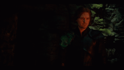 Man In Dark Room With Green Glove GIF