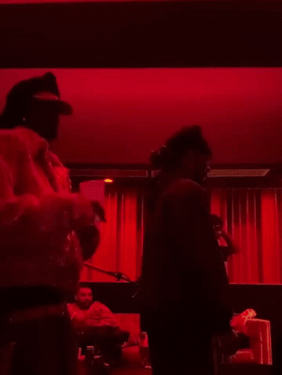 Man In Dark Room With Red Light GIF