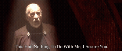 Man In Dark Room With Text GIF