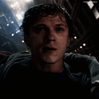 Man In Dark Room With Towel Around Shoulders GIF