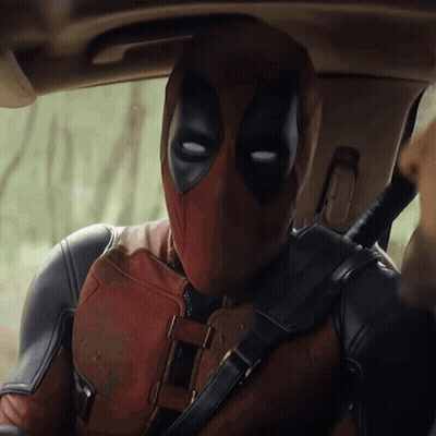 Man In Deadpool Suit Sitting In Car GIF