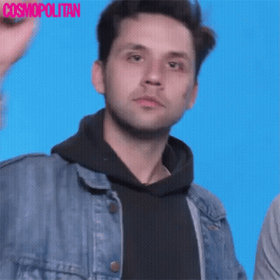 Man In Denim Jacket And Black Hoodie Waving GIF
