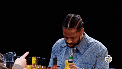 Man In Denim Jacket And Jamaica Shirt GIF