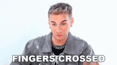 Man In Denim Jacket Crosses Fingers GIF