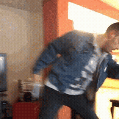 Man In Denim Jacket Dancing GIF