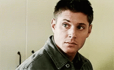 Man In Denim Jacket Looking At Camera GIF