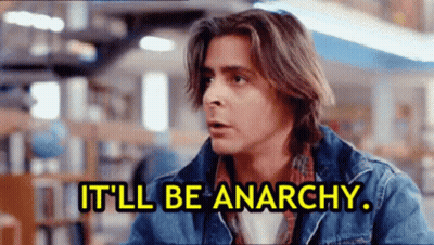 Man In Denim Jacket Saying It'll Be Anarchy GIF