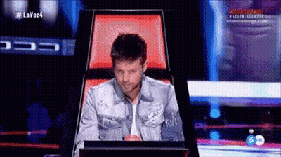 Man In Denim Jacket Sitting At Computer GIF