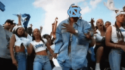 Man In Denim Jacket With N On Face GIF