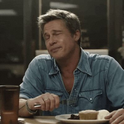 Man In Denim Shirt With Plate Of Food GIF