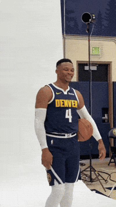 Man In Denver Jersey Number 4 Holding Basketball GIF