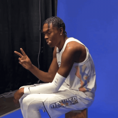 Man In Denver Jersey Sitting On Stool GIF