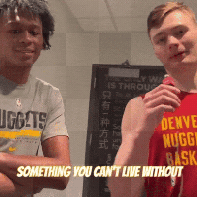 Man In Denver Nuggets Shirt Beside Another Man GIF