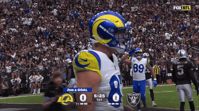 Man In Detroit Jersey Laying On Grass GIF