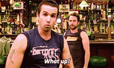 Man In Detroit Shirt Saying What Up In Bar GIF