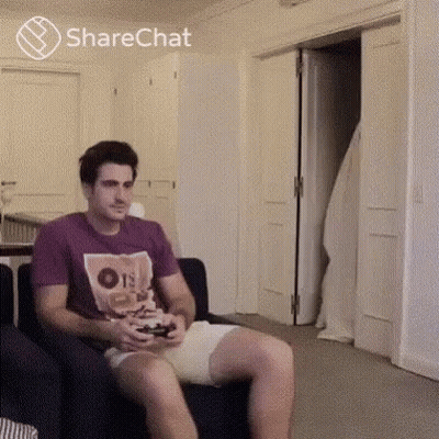 Man In Diaper Playing Video Game GIF