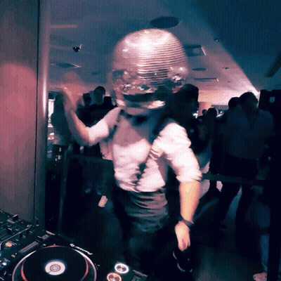 Man In Disco Ball Helmet Dancing In Front Of Pioneer Mixer GIF