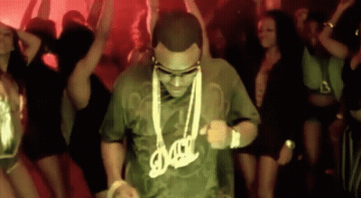 Man In DMC Shirt Dancing In Crowd GIF
