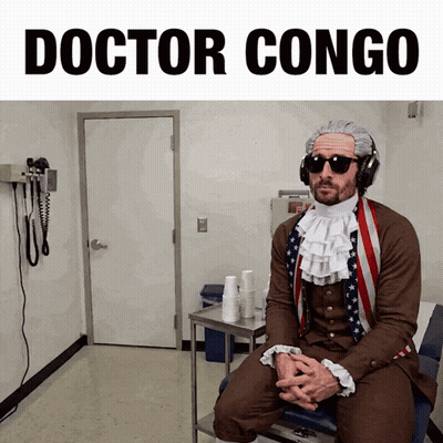 Man In Doctor Congo Costume Sitting On Chair GIF