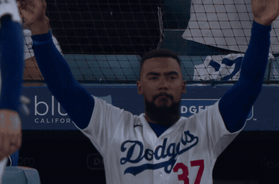 Man In Dodgers Jersey Arms Up GIF