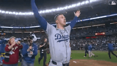 Man In Dodgers Jersey Celebrating On Field GIF