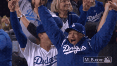 Man In Dodgers Jersey Holding Arms Up GIF