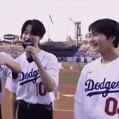 Man In Dodgers Jersey Holding Microphone GIF