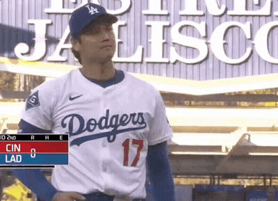 Man in Dodgers Jersey in Front of Jalisco Sign