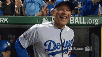 Man In Dodgers Jersey Laughing In Dugout GIF