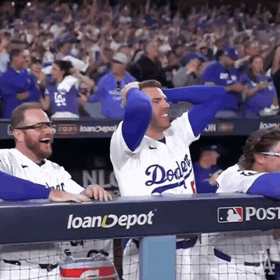 Man In Dodgers Jersey Laughing In Dugout GIF
