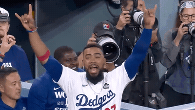 Man In Dodgers Jersey Making Horn Sign GIF