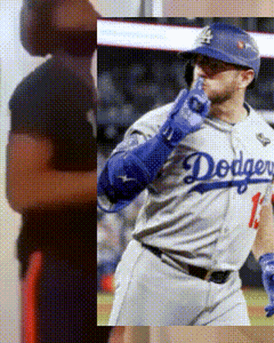 Man In Dodgers Jersey Next To Woman In Black Shirt GIF