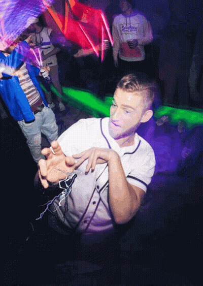 Man In Dodgers Sweatshirt Dancing In Crowd GIF