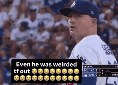 Man In Dodgers Uniform Looking At Crowd GIF