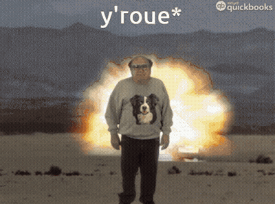 Man In Dog Sweater Standing In Front Of Explosion Saying Y' Roue GIF