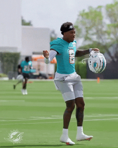 Man In Dolphins Uniform Holding Helmet GIF