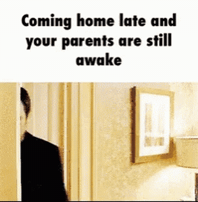 Man In Doorway Coming Home Late Parents Awake GIF
