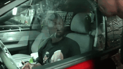 Man In Driver's Seat With Mouth Open GIF