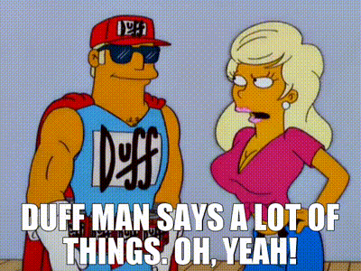 Man In Duff Shirt Standing Next To Woman GIF