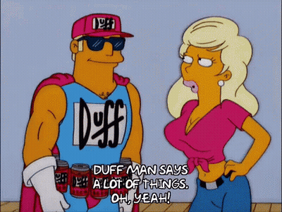 Man In Duff Shirt Talking To Woman In Pink GIF