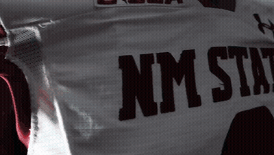 Man In E-USA NM State Football Jersey GIF