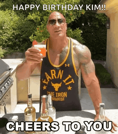Man In Earn It Shirt Holding Drink GIF