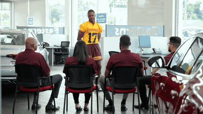 Man In Eastwood Jersey Standing Before Crowd GIF
