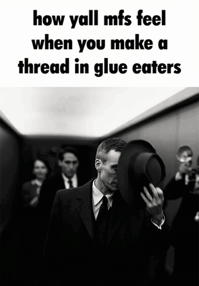 Man In Elevator Surprised By Thread In Glue GIF