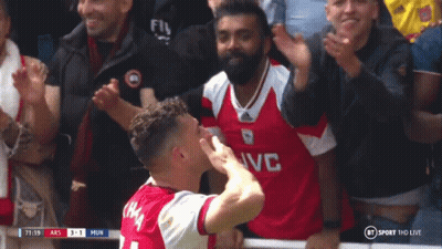 Man In Emirates Fly Better Shirt In Crowd GIF