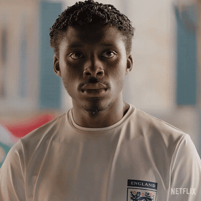 Man In England Shirt Looking At Camera GIF