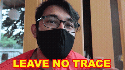 Man In Face Mask And Glasses Says Leave No Trace GIF