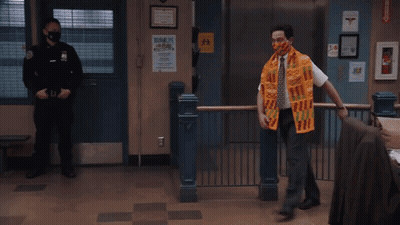 Man In Face Mask And Scarf Saying African GIF