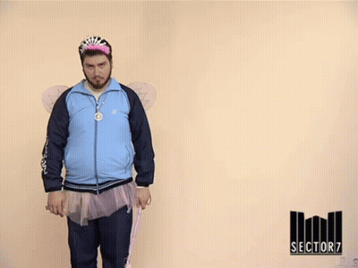 Man In Fairy Costume Holding Money In Front Of Fane Trotil Si Asociati Sign GIF