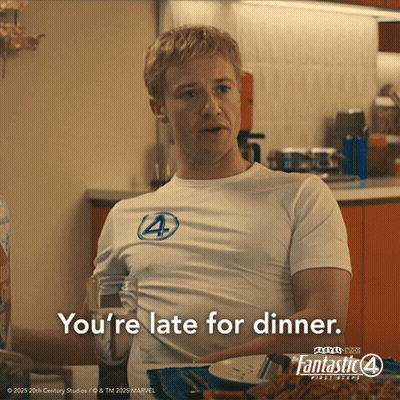 Man In Fantastic 4 Shirt At Table With Food GIF
